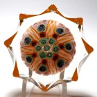 Large Strathearn Eight Pointed Star Paneled Millefiori Paperweight with Opaque Orange Ground