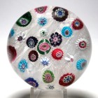 Large Antique Clichy Spaced Concentric Millefiori Paperweight with 25 canes including a Green and Pink Rose