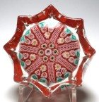 Large Strathearn Eight Pointed Star Paneled Millefiori Paperweight with Opaque Rust Red Ground
